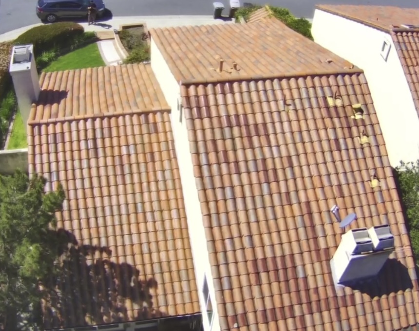 aerial view of house with tile roof